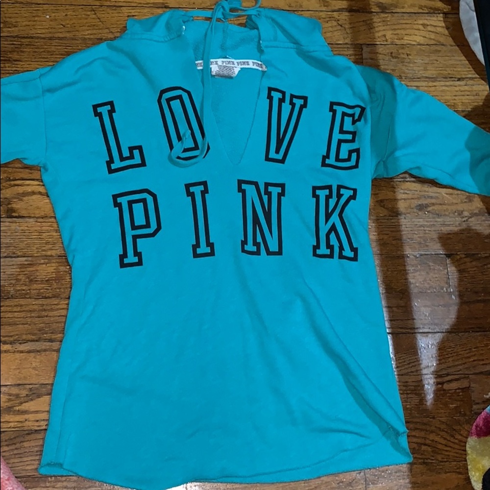 Blue sweater from pink